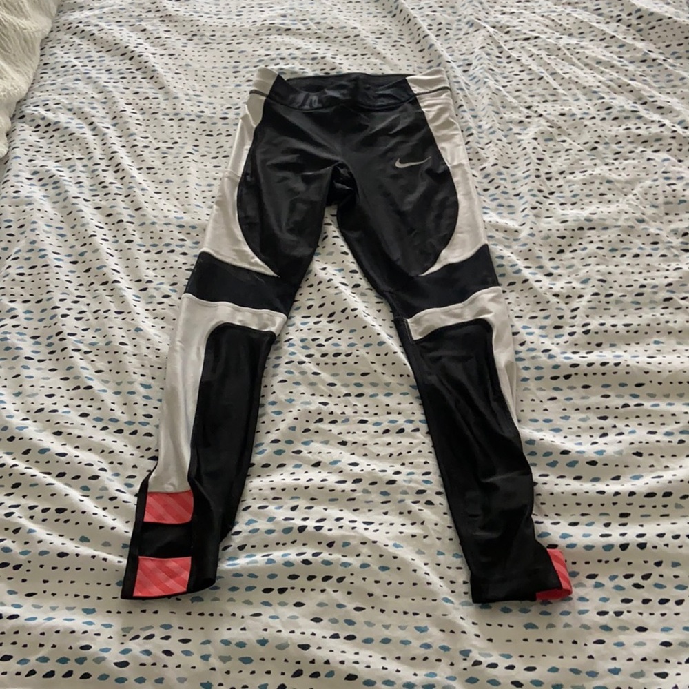 Nike running speed leggings in black with cutouts